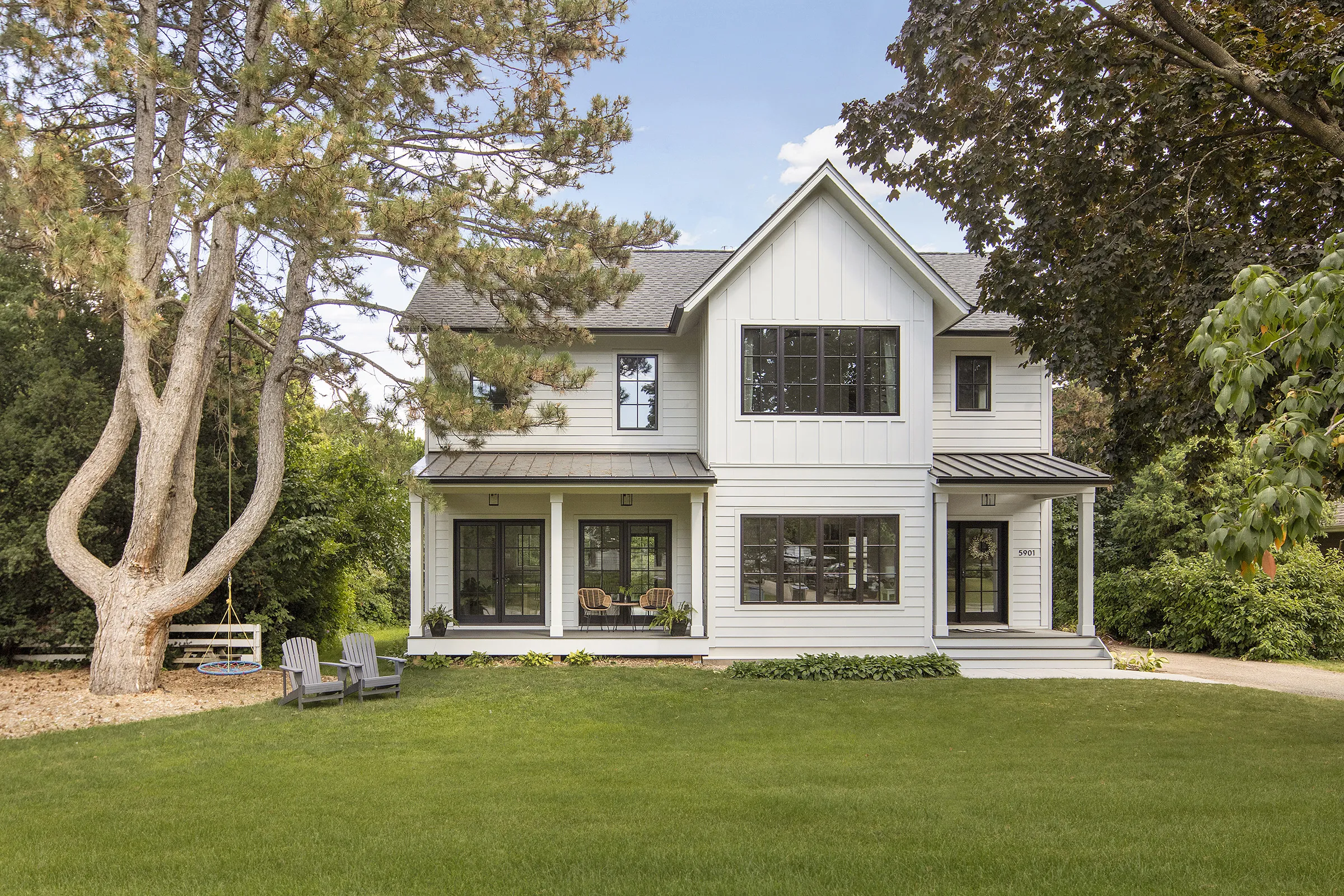 Modern Farmhouse, front porch, off white siding, black windows.