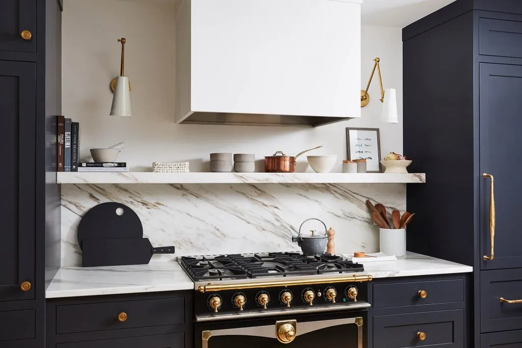 Marble shelf under the hood, above kitchen range.