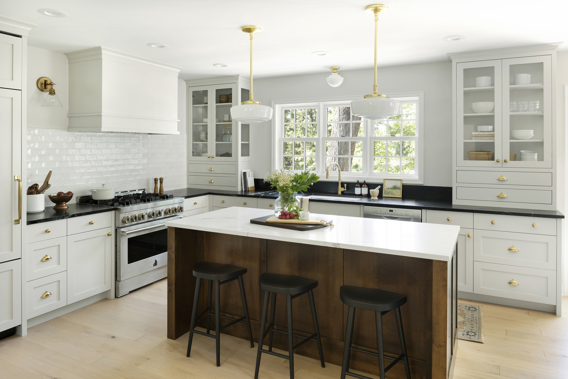 Traditional two tone kitchen with soapstone countertops.