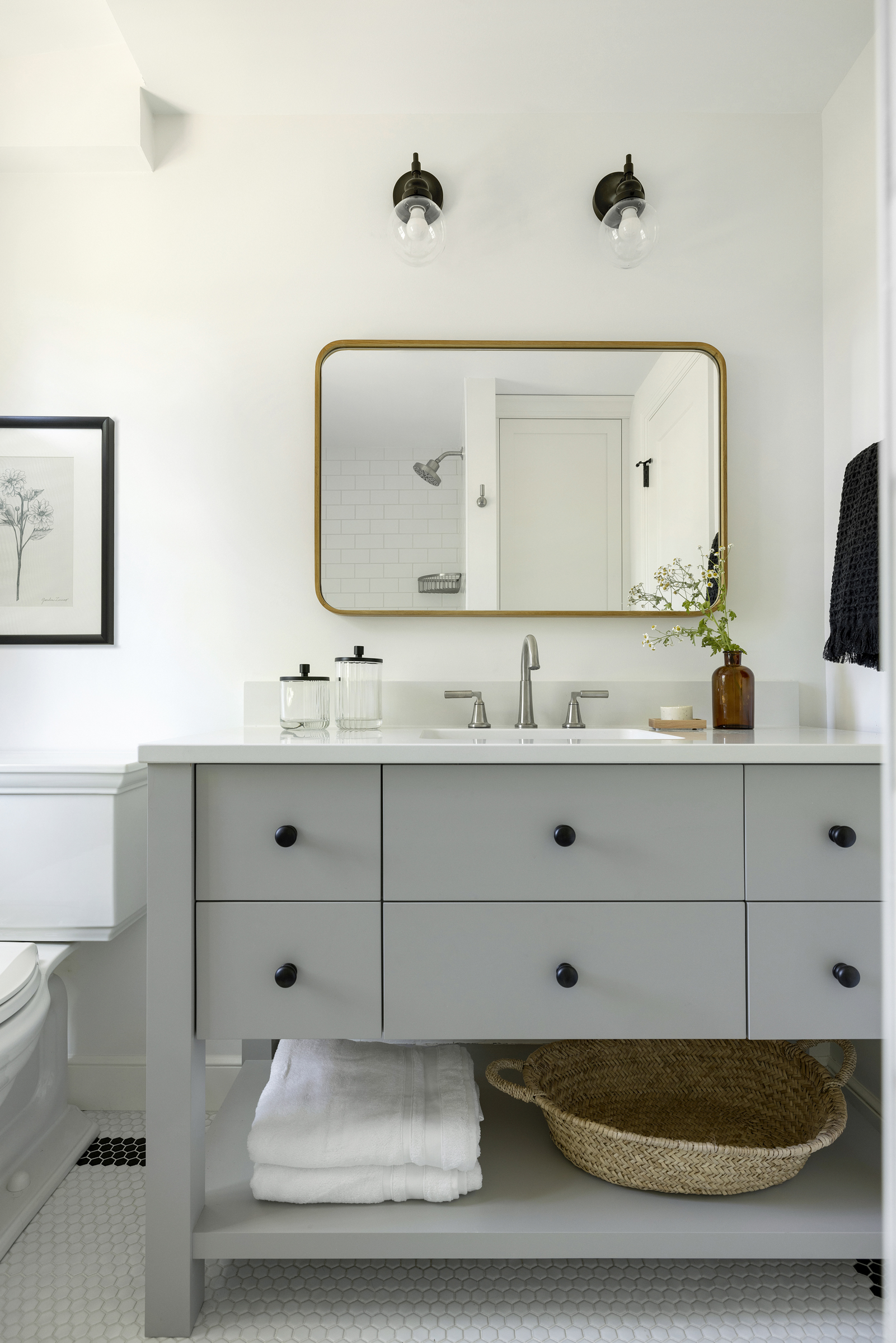 Twin Cities bathroom renovation with Jkath Arden gray vanity.