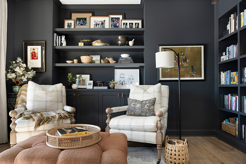 Moody dark home library with rick color and textures.
