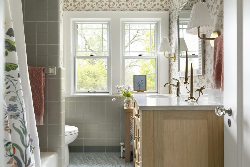 How to Refresh a 1920s Home, While Mixing Modern and Traditional Design Styles. Custom white oak vanity, original green wall and floor tile.